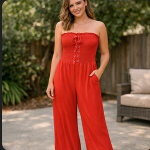 Toxik3 Red Strapless Smocked Lace Up Front Wide Leg Jumpsuit NWOT Medium